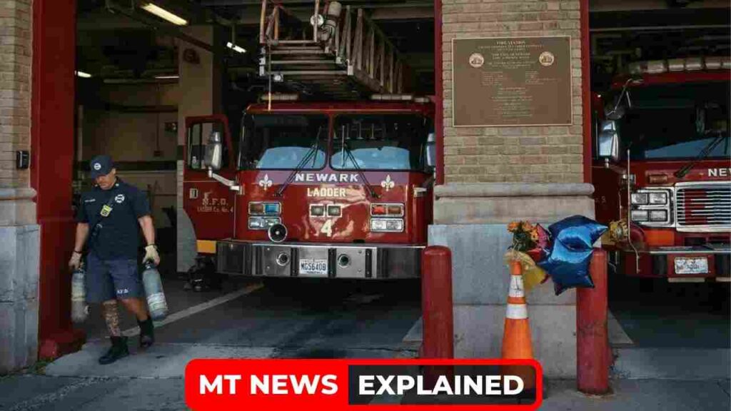 In honour of the deceased men, flowers were placed in front of a fire station in Newark. (Source: nytimes)